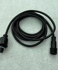 Heavy Duty Beast Mode 4 Core 18AWG Extension Cord Waterproof Male To Female Connector Black Cable 25 Feet Long on gray background.