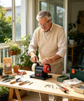 Compact Tabletop Mini Bench Grinder Featuring Dual Grinding Wheels For Precision Tool Sharpening And Rough Burr Removal with a senior man polishing a knife.