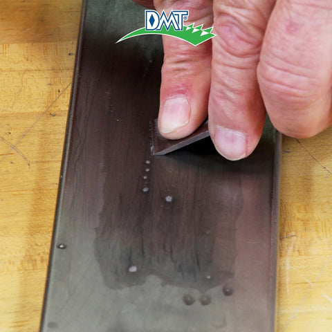Dia Sharp Diamond Knife Sharpener For Home Chefs Extra Extra Fine Diamond Sharpening Stone Eight Inch in use, close-up