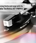 Close-up of Audio Technica AT-VM95C cartridge on turntable for Fully Automatic Belt Drive Turntable Bundle With SAM30 3 Inch Powered Studio Monitors And Polypropylene Woofers Delivers Dope Crisp Sound On 33 And 45 RPM Records With J Shaped Tonearm For Smooth Tracking And High Fidelity Playback