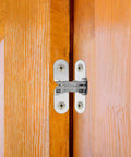 Foldable Hidden Door Hinge For Cabinets, Concealed Cross Hinge Made Of Zinc Alloy And Stainless Steel on wooden door