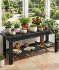 Rugged Rustic Storage Bench With Solid Wood Seat And Slatted Shelf Indoor Outdoor Shoe Rack 450 Lb Capacity Black 40 Inch Bench with potted plants