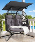 Double Egg Chair With Removable Adjustable Canopy for Outdoor Hangout Patio Balcony, grey cushioned, set on a wooden deck