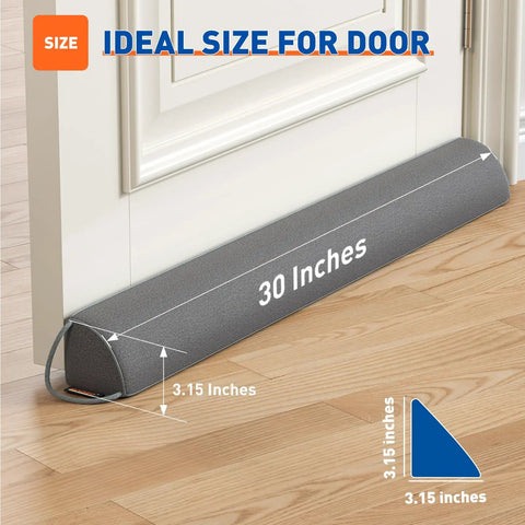 Heavy Duty Triangular Under Door Draft Stopper Works Like A Charm By Plugging Cold Drafts And Road Noise With A Weighted Core That Slides Right Into Place On Any Surface In Cool Gray, measuring 30 inches.