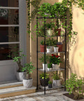 5 Tier Heavy Duty Wire Shelving Rack With Raised Edges And Oil Resistant Baked Finish Fully Adjustable Pantry Storage Organizer With plants.