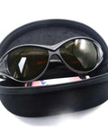 Badass OD4 Plus Laser Safety Goggles Offering Rock Solid Eye Shield From UV Through Near Infrared Bands Designed For Heavy Duty Lab Work And Precision Manufacturing in a black protective case.