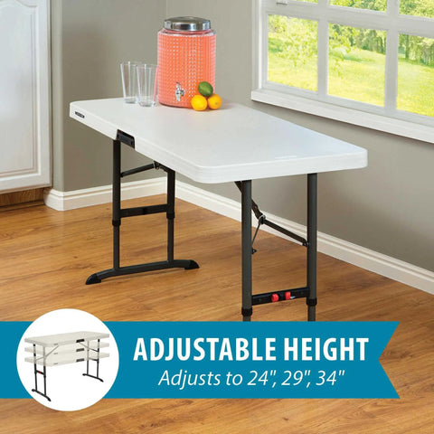 Commercial Adjustable Folding Table For Indoor And Outdoor Use 4 Foot Surface With Solid Seamless Top Height Settings Of 24 29 And 34 Inches Lightweight Durable HDPE Top With Powder Coated Steel Frame Almond set for indoor use near window.