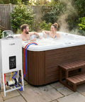 Powerful 105000 BTU Propane Pool Heater Delivers Crazy Fast Heating For Above Ground Pools Hot Tubs And Spas With Digital Thermostat Portable With Wheels For Easy Outdoors next to a hot tub in a backyard.