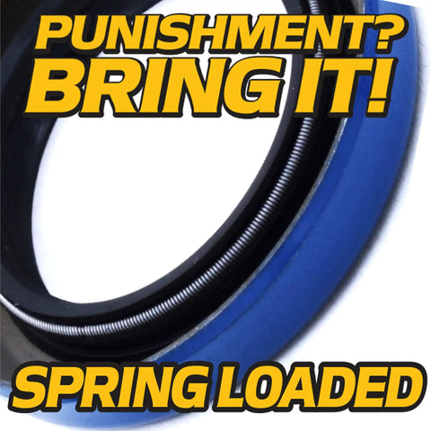 Badass Deck Spindle Bearing Rebuild Kit Featuring C3 High-Speed Bearings and Heavy-Duty Seals Packed with Hi-Temp Synthetic Grease for John Deere Ztrak Eztrak Ride-On Mowers, detailed close-up of the spring-loaded seal.
