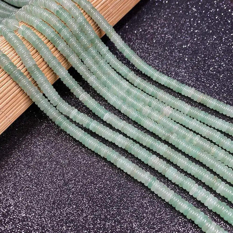 Fresh Hand Polished Natural Fluorite Stone Beads Cylinder Abacus Shape Loose Spacer Gems Dope DIY Bracelet And Necklace Jewelry Making Supplies Craft Kit 2X6MM laid out on a surface.