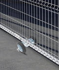 Heavy Duty Sliding Gate Hardware Kit With Rock Solid Double Roller Track Handles 600 Lbs, showcasing steel wheels on a driveway.