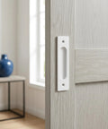 Heavy Duty Aluminum Flush Pulls 2 Pack Recessed Sliding Door Handles With Mounting Screws Barn Closet And Cabinet Drawer Knobs Super Quick Install Pocket Door Hardware Fresh White Finish 5.9 Inch installed on a wooden sliding door.