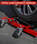 Set Of Two Heavy Duty Hydraulic Wheel Dollies With Foot Pump Lift And Six Thousand Pound Capacity For Smooth Rolling Tire Skates showing red dolly under tire.