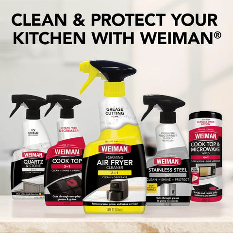Front view of six Weiman kitchen cleaners and wipes, center 14 oz Foaming Air Fryer Cleaner with yellow trigger.
