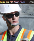 Badass Bulk Pack Safety Glasses Polycarbonate Lenses Black Tinted Antiscratch Impact Resistant ANSI Certified work goggles worn by worker.
