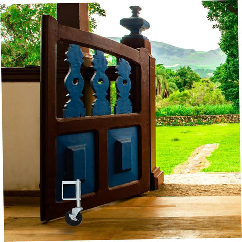 Smooth Rolling Heavy Duty Spring Loaded Gate Wheel With Automatic Telescopic Adjustment Cold Rolled Steel Replacement Caster on a wooden gate.