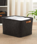 Hella Spacious Rectangular Felt Storage Basket With Faux Leather Handles, Collapsible Gray Organizer Bin For Toys Gear And Linens, with towels inside.