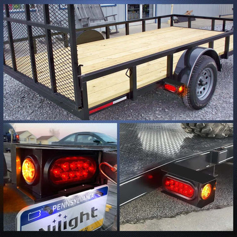 Two Pack Beefy Steel Trailer Light Boxes Housing Kit With 6 Inch Oval Red Tail Lights on a black metal trailer