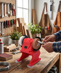 Hassle Free Cordless Mini Bench Grinder Spinning At 5500 Rpm For Lightning Fast Metal Polishing in a workshop setup.