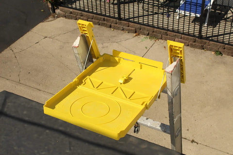 Universal Ladder Tray Rack Fits Extension And Step Ladders Heavy Duty Mid Section Tool Shelf securely holding tools, yellow design.