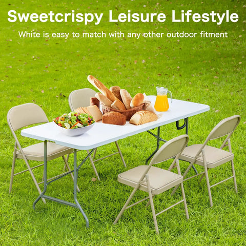 Four Foot Go To Folding Picnic Table With Carrying Handle Easy To Fold And Store Portable Lightweight Table with food outdoors.