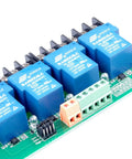 Close-up of blue 8 Channel Relay Module with Optocoupler Isolation for PLC Automation Control, 30A Load, green PCB board visible