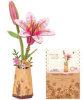 Front view of 3D Wooden Lily Flower Puzzle DIY Kit For Home Decor And Relaxing Adult Crafts Artificial Wood Flower Gift For Valentine Day A Forever Bloom That Lasts And Brightens Any Space, showing assembled lily in a vase with packaging.