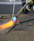 Trigger Start Butane Torch TS8000 With Beast Heat And Instant On Off Ignition in use for brazing metal rods on a workbench