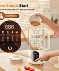 50 Oz Nut Milk Maker With 10 In 1 Functions And 20 Blades in use with almond milk ingredients being added