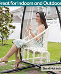 Woman sitting in Macrame Hammock Chair Hanging Swing For Indoor Outdoor Use 330 Lbs Capacity Handwoven Cotton Rope with Cushions