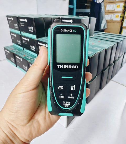 Dead On Accurate Six In One Laser Distance Meter Sixty Foot Range Class 2 Safe Beam in hand with packaging in background.