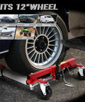 Heavy Duty Wheel Dolly Jack Set with Hydraulic Tire Lift and Aluminum Twin Rollers Foot Pump Action for Rock Solid Garage Shifts Tough as Nails 1500 Pound Capacity shown lifting 12 inch wheel with foot pump action.