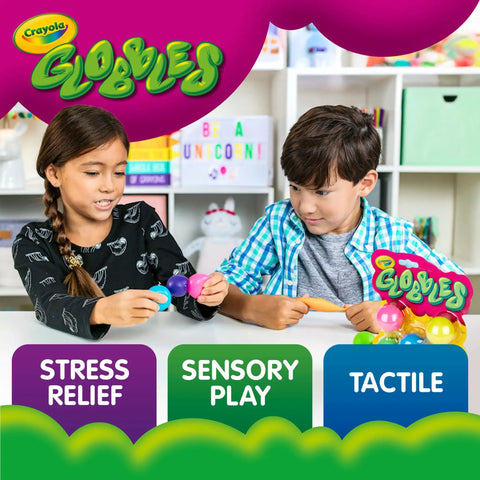 Two children engaging with Crayola Globles for stress relief, sensory play, and tactile fun using colorful rubber spheres.