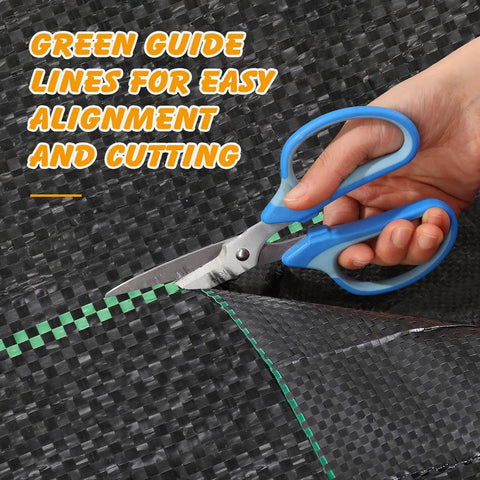 Weed Barrier Landscape Fabric 4 Foot By 100 Foot Woven Ground Cover with green printed guide lines being cut with scissors.