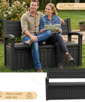 Couple sitting on Built Tough Outdoor Storage Bench With 80 Gallon Lockable Waterproof Storage Chest For Patio Garden And Porch