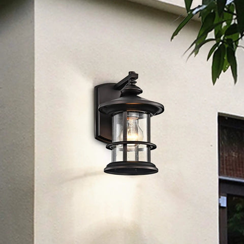 Rustic Cottage Outdoor Wall Light 2 Pack 100W Max 10 Inch Oil Rubbed Bronze Exterior Sconce with clear seedy glass, mounted on wall.