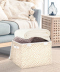 Built Tough Foldable Storage Bin With Slick Flip Top Lid And Locked Down Velcro Closure Durable Oxford Fabric Collapsible Closet Organizer For Home Bedroom No Sweat Space Savers filled with rolled blankets in a living room.