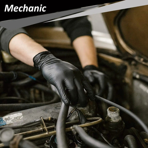 Durable Nitrile Disposable Gloves 4 Mil Thick 1000 Count Powder Free Latex Free Food Safe being used by a mechanic.