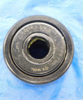 Rock Solid Cam Yoke Roller Bearing With Lubri Disc Seal 1 3/4 Inch Outer Diameter And Half Inch Inner Bore on blue background.