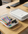 Slick Clear Hard Shell Zipper Case Set With 9 Multi Size Compartments storing pens and papers on an office desk.