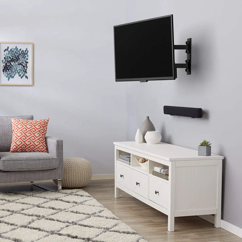 Built Tough Full Motion TV Wall Mount With Effortless Swivel And Tilt Angles For Twenty Six To Fifty Five Inch Screens Handling Up To Eighty Pounds mounted above a white entertainment center