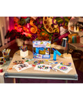 Rad Battery Powered Airbrush Marker Spray Craft Kit Smooth Glide Washable Ink Pens Plus Five Reusable Design Stencils on art table.