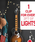 Guitar wall decor with string lights using Damage Free Indoor Mini Light Clips Value Pack With 45 Clips And 54 Strips.