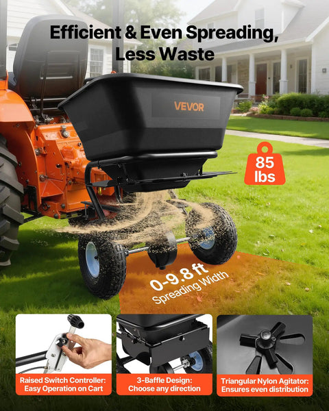 Tow Behind Lawn Spreader For Seed Fertilizer Ice Melt, 9.8 Foot Spreading Width, 85 Lb Hopper, 10 Inch All Terrain Tires, Adjustable Flow Control, Broadcast Spreader Pro Grade For Yard Work And Lawn Care attached to a lawn tractor, spreading material on grass.