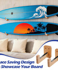 Top Shelf Beech Wood Surfboard Wall Mount Rack With Grippy Non Slip V Pads For Rock Solid Vertical Storage Of Longboards Shortboards Skis And Snow Gear, showcasing two surfboards on wall.