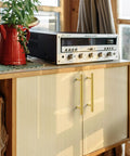 Top Shelf Six Pack Solid Brass T Bar Cabinet Pulls Hella Durable Gold Hardware For Kitchens And Dressers Clean Hammered Polish With Five Inch Center Spacing on a cabinet.