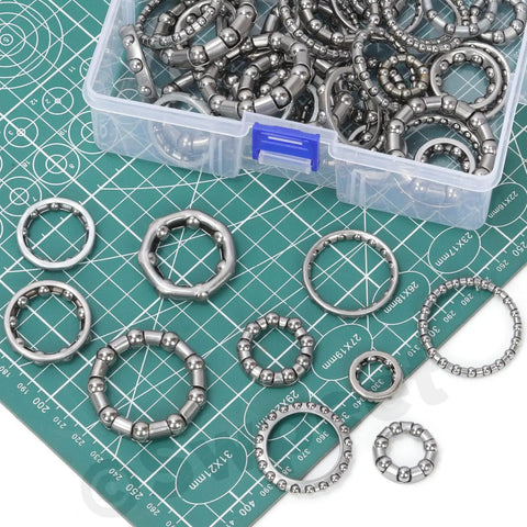 Top Shelf Bicycle Ball Bearing Repair Kit Includes Fifty Precision Steel Roller Bearings In Ten Essential Sizes arranged in a plastic container.