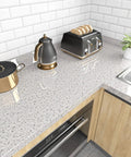 Kitchen countertop with Grey Marble Granite Contact Paper Peel And Stick 36x200 inch roll, showing waterproof surface and modern appliances.