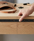 Hand installing 4 pack black stainless steel flat straight brackets with screws for kitchen cabinets, heavy duty mending plates