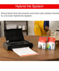 On The Go Wireless Portable Printer With 50 Sheet Paper Tray And 1.44 Inch Display on a table next to ink cartridges
